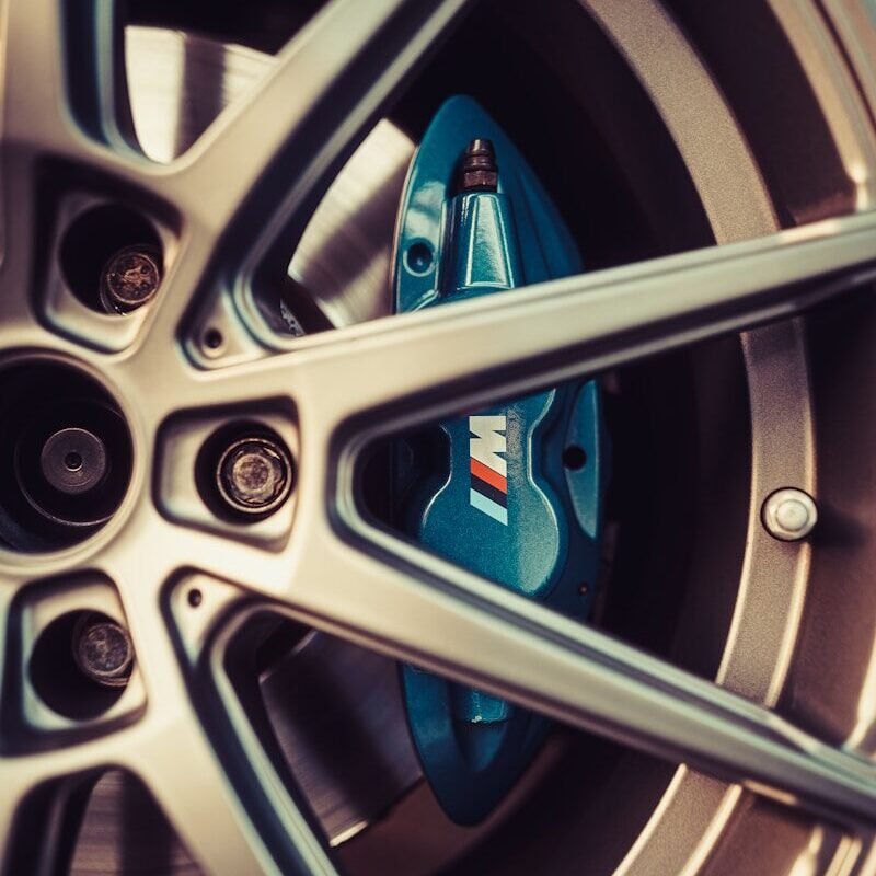 gray and blue multi spoke wheel